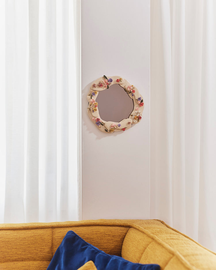 Petit miroir fleurs sculptées