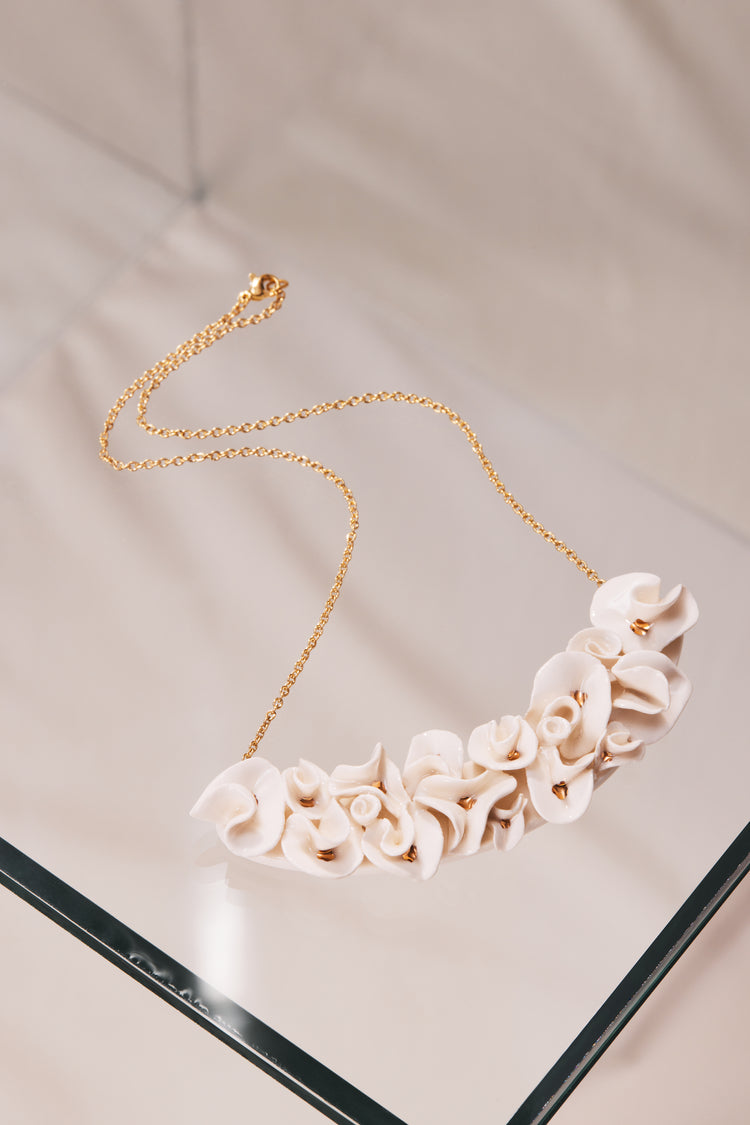 White and gold flower necklace