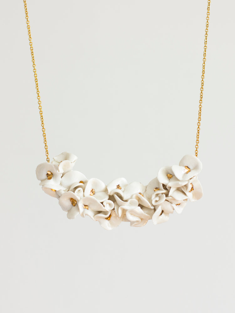 White and gold flower necklace