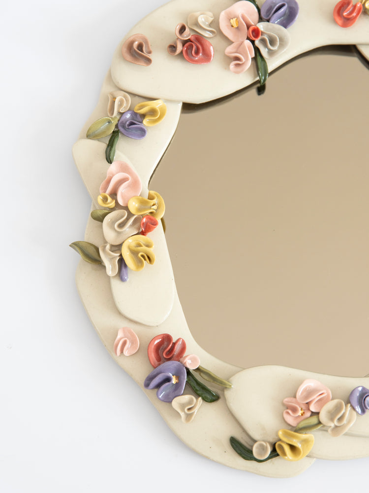 Petit miroir fleurs sculptées