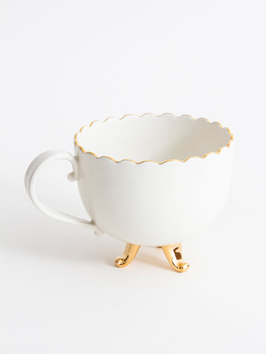 Cup with gold feet 