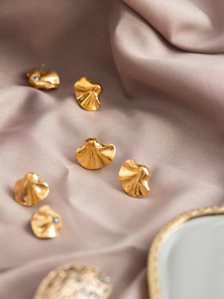 Frilly gold earrings