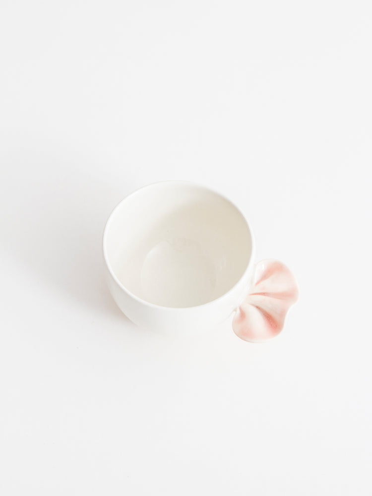 Bol à thé avec froufrou rose