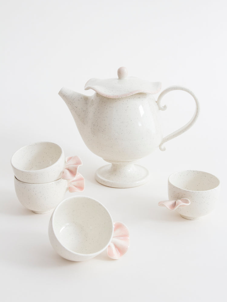 Teapot with pink edging