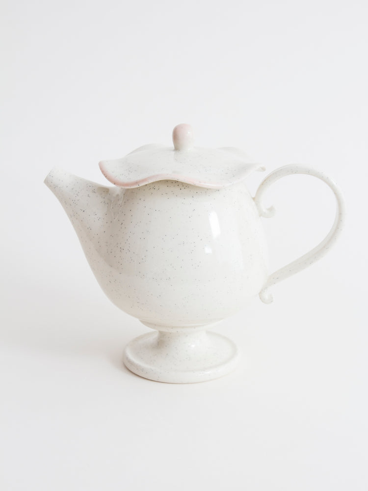 Teapot with pink edging